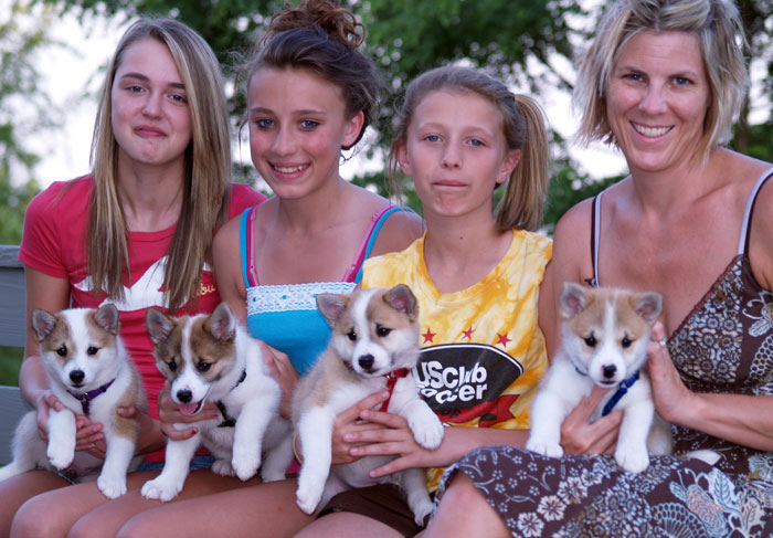 Kristy and the girsl with all four pups